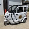 White 3-wheel electric trike for firefighter patrolling